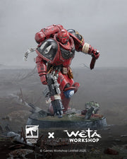 Warhammer 40k - Blood Angels Intercessor Sergeant 1:10 Statue (Weta Workshop). Red and black armored figure with a weapon on a gray background, featuring Weta Workshop branding.