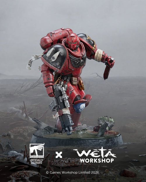 Warhammer 40k - Blood Angels Intercessor Sergeant 1:10 Statue (Weta Workshop). Red and black armored figure with a weapon on a gray background, featuring Weta Workshop branding.