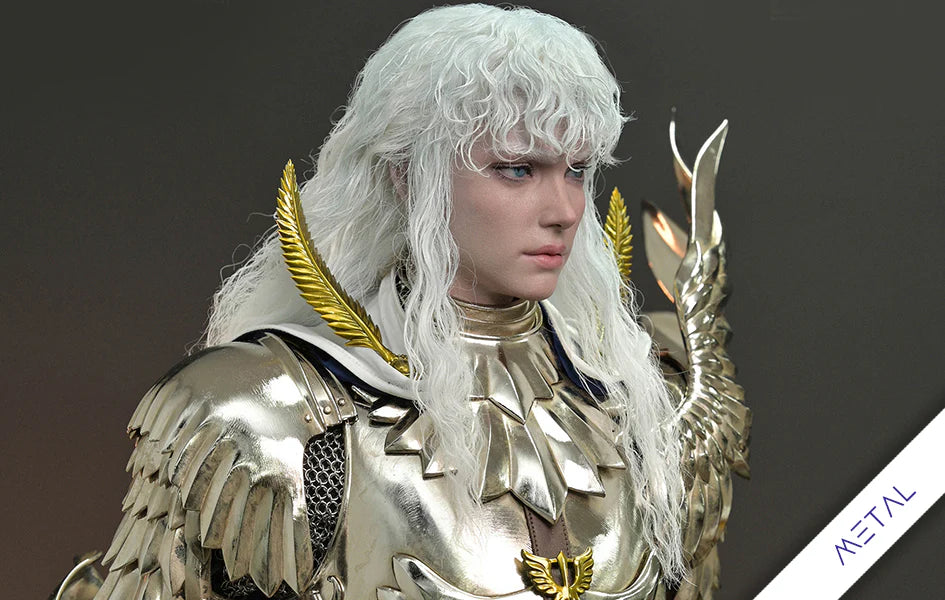 A highly detailed collectible statue of a white-haired female warrior in metallic gold armor with gold wing-like shoulder pieces, shown against a dark gray studio background. A white diagonal banner in the bottom right corner features the text 'METAL'. Griffith – Berserk (JND Studios) Metal Armor Deluxe Version 1/3 Scale Statue