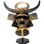 Assassin’s Creed Yasuke Helmet 1:1 Scale Replica – PureArts. Samurai helmet with gold accents on a white background