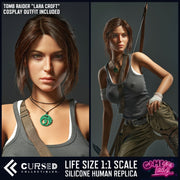 Lara (Tomb Raider) Realistic Silicone 1:1 Replica Cosplay Model Doll (Game Lady). Promotional product image for a life size 1:1 scale silicone human replica of Lara Croft from Tomb Raider, shown in a split portrait and full-body render on a dark gray background. Text indicates the 'Lara Croft' cosplay outfit is included and the brand is Cursed Collectibles. Tomb Raider Sex Doll.