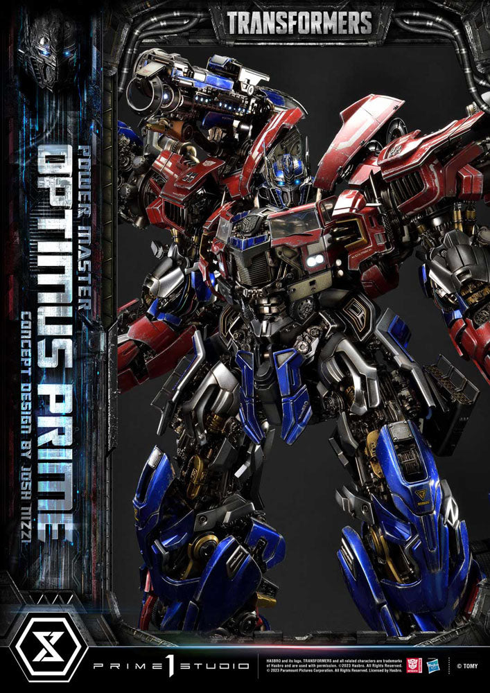 Transformers model of Optimus Prime with branding and studio name on a dark background. Transformers Museum Masterline Statue Powermaster Optimus Prime Concept by Josh Nizzi Ultimate Version 99 cm